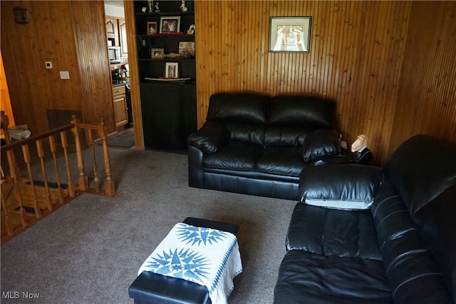 6019 New London Rd, Ashtabula, OH 44004 - living area with wooden walls and carpet