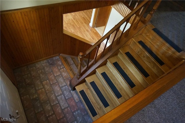 6019 New London Rd, Ashtabula, OH 44004 - stairs with brick flooring and wood walls