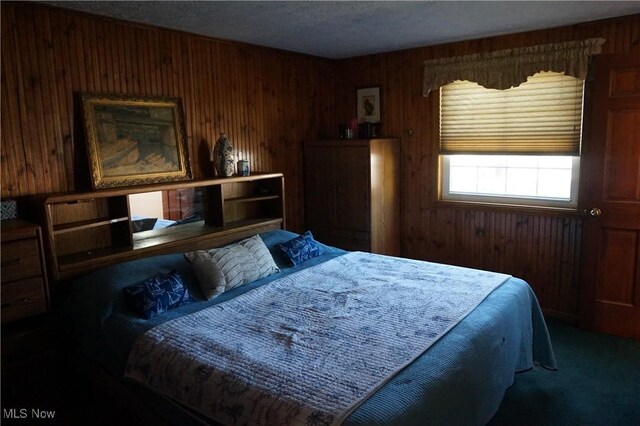 6019 New London Rd, Ashtabula, OH 44004 - carpeted bedroom featuring wood walls