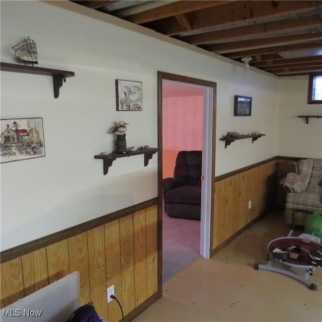 576 12th St NW, Carrollton, OH 44615 - basement featuring a wainscoted wall and wooden walls