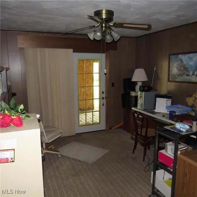 576 12th St NW, Carrollton, OH 44615 - office area with a ceiling fan and wood walls