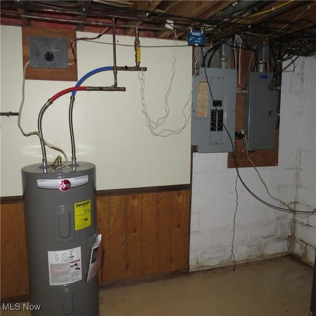 576 12th St NW, Carrollton, OH 44615 - unfinished basement featuring electric panel and electric water heater