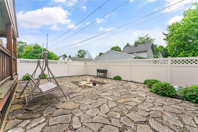 97 Overlook Blvd, Struthers, OH 44471 - fenced backyard featuring a patio