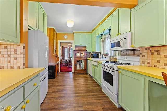 97 Overlook Blvd, Struthers, OH 44471 - kitchen featuring white appliances, green cabinetry, light countertops, and healthy amount of natural light