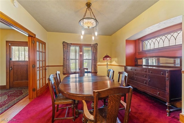 97 Overlook Blvd, Struthers, OH 44471 - dining space with healthy amount of natural light and french doors