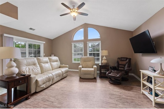 4044 Saint Andrews Ct, Canfield, OH 44406 - living room featuring a ceiling fan, baseboards, vaulted ceiling, and wood finished floors