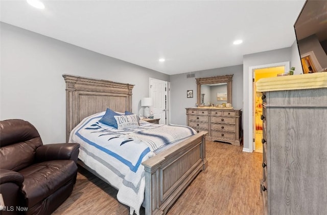 4044 Saint Andrews Ct, Canfield, OH 44406 - bedroom with light wood-style floors, recessed lighting, and baseboards