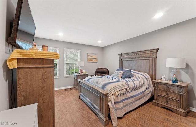 4044 Saint Andrews Ct, Canfield, OH 44406 - bedroom featuring light wood-style floors, baseboards, and recessed lighting