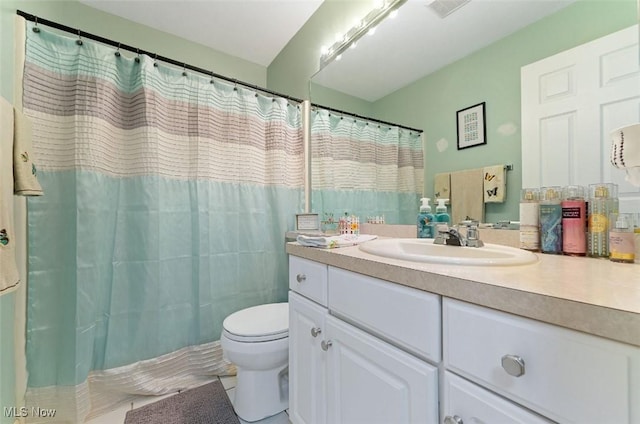 4044 Saint Andrews Ct, Canfield, OH 44406 - bathroom with toilet, vanity, tile patterned flooring, and curtained shower