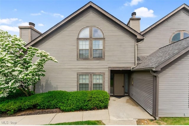 4044 Saint Andrews Ct, Canfield, OH 44406 - multi unit property featuring a chimney and a shingled roof