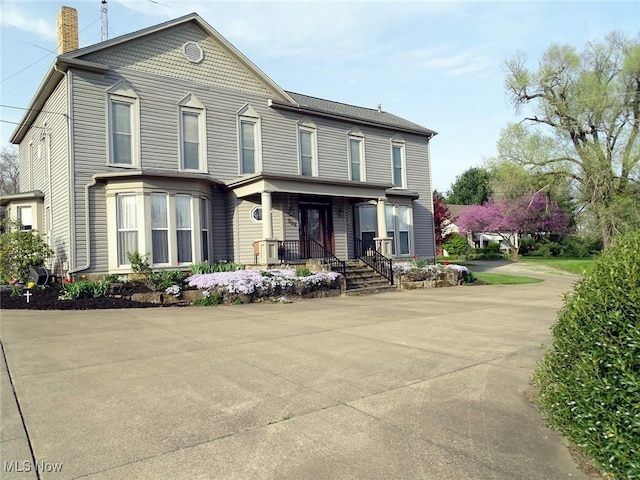 518 Hill St, Coshocton, OH 43812 - victorian-style house with a chimney and covered porch