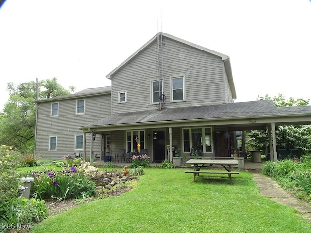 518 Hill St, Coshocton, OH 43812 - back of property featuring a lawn