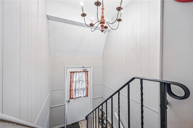 4438-4440 Washington Square Dr, Austintown, OH 44515 - staircase featuring a chandelier and vaulted ceiling