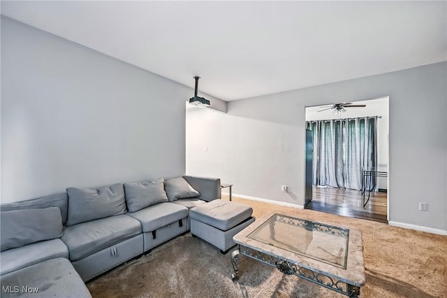 4438-4440 Washington Square Dr, Austintown, OH 44515 - living room featuring carpet flooring, baseboards, and a ceiling fan