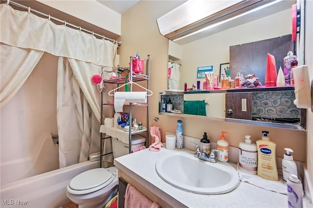4438-4440 Washington Square Dr, Austintown, OH 44515 - bathroom with vanity, shower / bath combination with curtain, and toilet