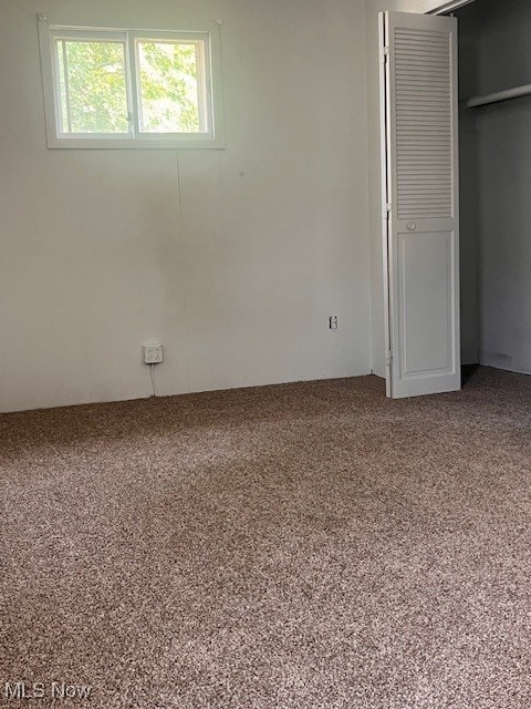 296 Sanderson Ave, Campbell, OH 44405 - unfurnished bedroom featuring carpet flooring and a closet