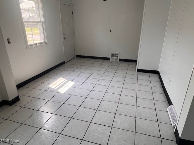 296 Sanderson Ave, Campbell, OH 44405 - unfurnished room featuring baseboards and light tile patterned flooring