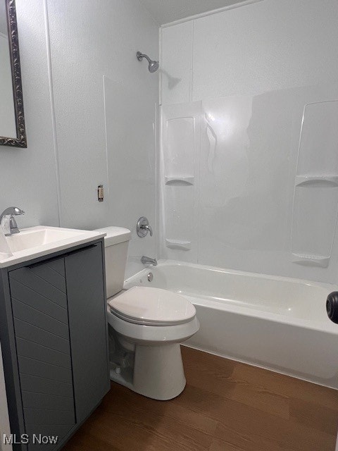 296 Sanderson Ave, Campbell, OH 44405 - bathroom with vanity,  shower combination, wood finished floors, and toilet