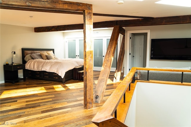 2337 W 11th St Unit 6, Cleveland, OH 44113 - bedroom featuring wood finished floors and beamed ceiling