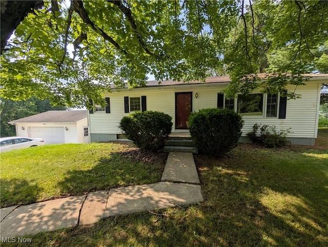 5710 Sugargrove Rd, Blue Rock, OH 43720 - ranch-style home with a front yard and an attached garage
