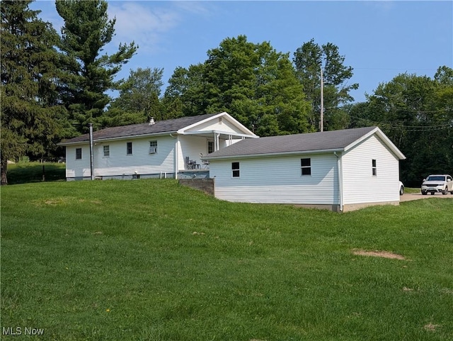 5710 Sugargrove Rd, Blue Rock, OH 43720 - rear view of property with a lawn