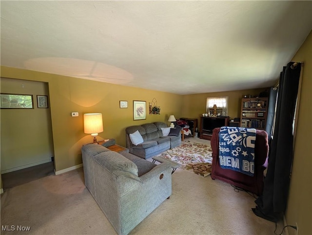 5710 Sugargrove Rd, Blue Rock, OH 43720 - carpeted living room featuring baseboards