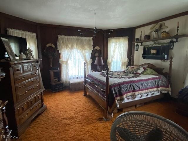 705 Main St, Toronto, OH 43964 - carpeted bedroom with a wood stove