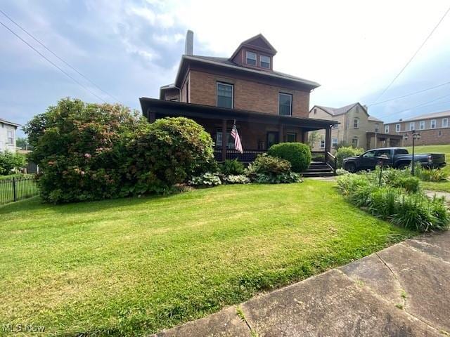 705 Main St, Toronto, OH 43964 - rear view of house featuring a porch and brick siding