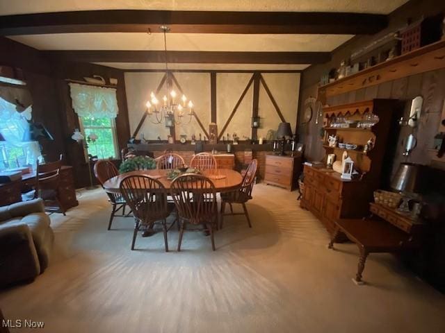 705 Main St, Toronto, OH 43964 - dining space featuring beam ceiling, a chandelier, and light colored carpet