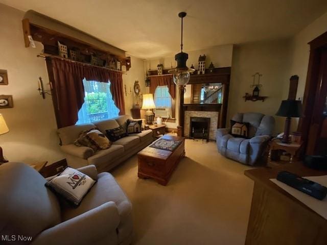 705 Main St, Toronto, OH 43964 - living room with a fireplace and carpet