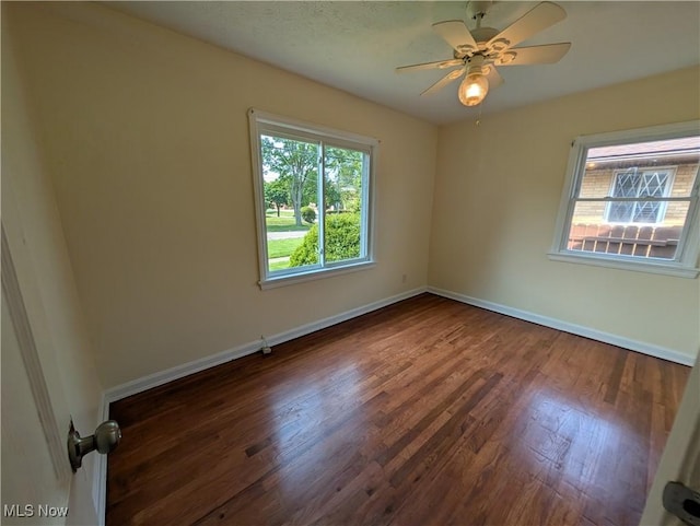 727 N Firestone Blvd, Akron, OH 44306 - spare room featuring baseboards, wood finished floors, and ceiling fan