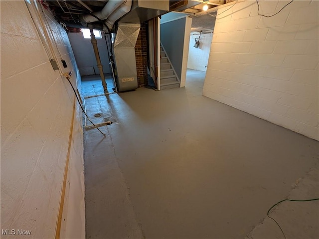 727 N Firestone Blvd, Akron, OH 44306 - below grade area featuring stairway and heating unit