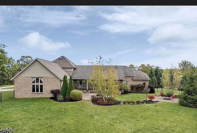 8320 Westfield Rd, Seville, OH 44273 - back of property featuring brick siding