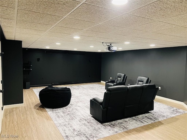 8320 Westfield Rd, Seville, OH 44273 - cinema room with wood finished floors, baseboards, a drop ceiling, and recessed lighting