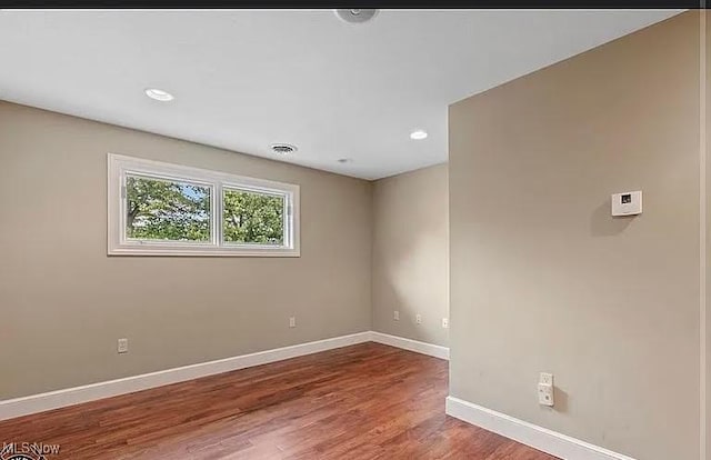 8320 Westfield Rd, Seville, OH 44273 - unfurnished room featuring baseboards, wood finished floors, and recessed lighting