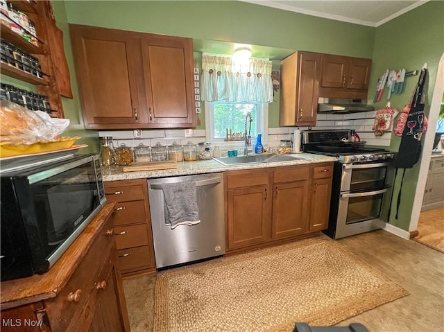 627 Elson St, East Liverpool, OH 43920 - kitchen featuring stainless steel appliances, crown molding, tasteful backsplash, ventilation hood, and light countertops