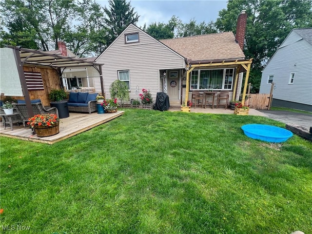 627 Elson St, East Liverpool, OH 43920 - back of property featuring an outdoor living space, a chimney, a yard, and roof with shingles