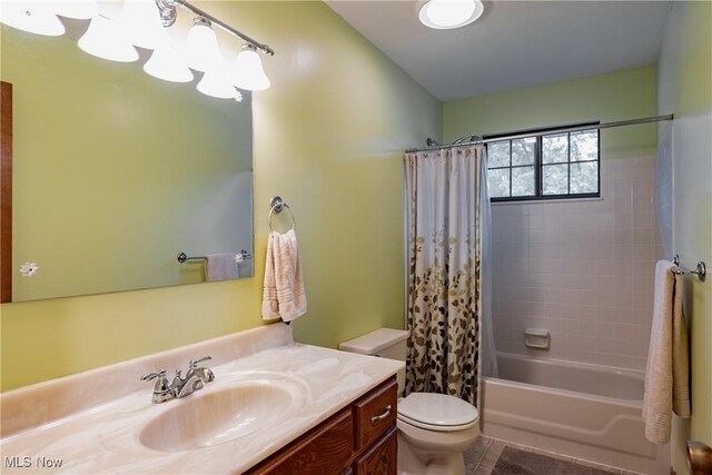 488 Maple Dr, Williamstown, WV 26187 - full bathroom featuring vanity, toilet, shower / tub combo with curtain, and tile patterned flooring