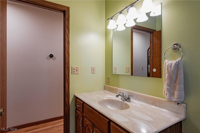 488 Maple Dr, Williamstown, WV 26187 - bathroom with vanity and wood finished floors