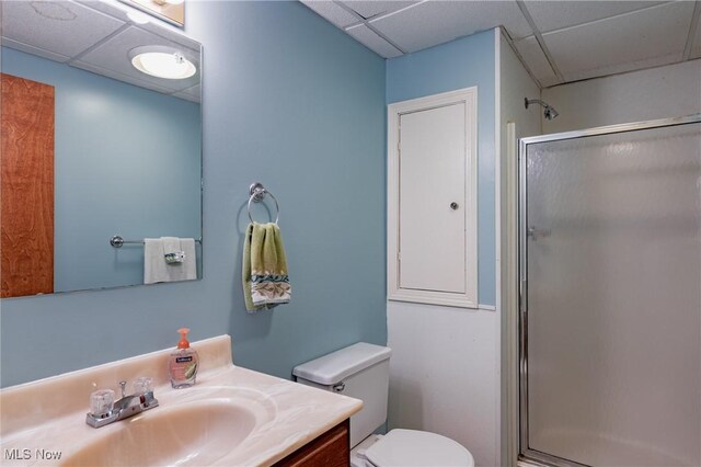 488 Maple Dr, Williamstown, WV 26187 - bathroom featuring a drop ceiling, an enclosed shower, vanity, and toilet