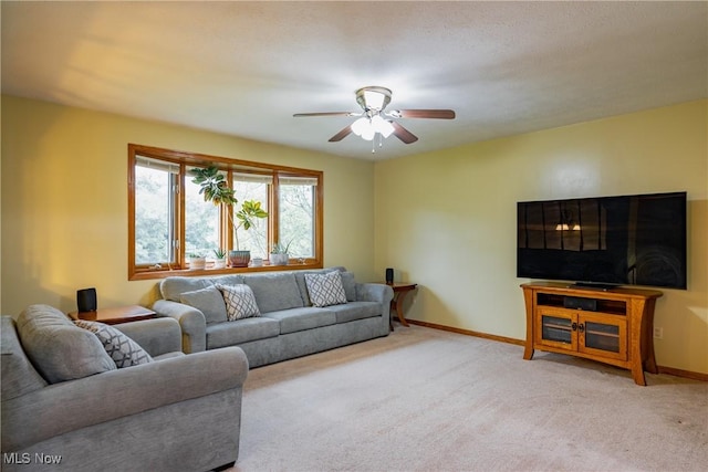 488 Maple Dr, Williamstown, WV 26187 - living room with carpet flooring, ceiling fan, and baseboards