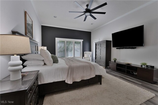 6170 Deer Spring Run, Canfield, OH 44406 - bedroom featuring wood finished floors, crown molding, and a ceiling fan