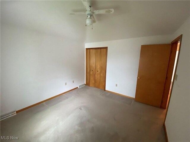 6234 W 54th St, Parma, OH 44129 - unfurnished bedroom with a closet, baseboards, and ceiling fan