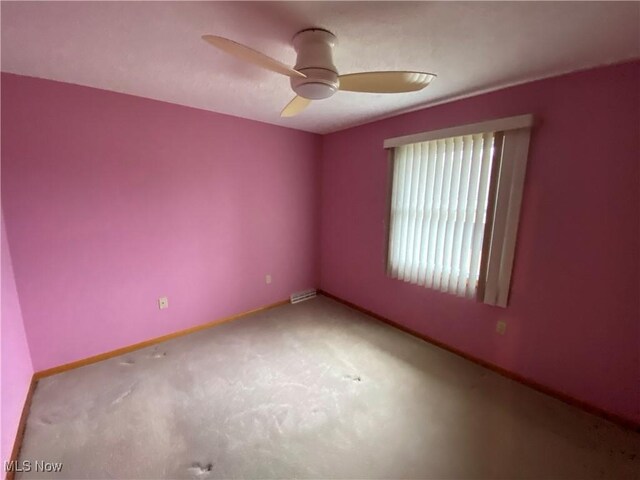 6234 W 54th St, Parma, OH 44129 - carpeted spare room featuring ceiling fan and baseboards