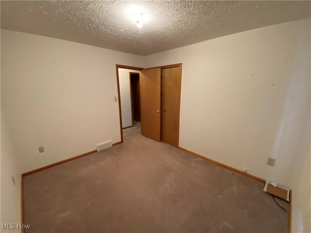 6234 W 54th St, Parma, OH 44129 - spare room featuring light colored carpet and baseboards