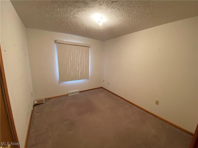 6234 W 54th St, Parma, OH 44129 - carpeted empty room featuring baseboards and a textured ceiling