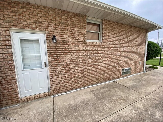 6234 W 54th St, Parma, OH 44129 - view of exterior entry with brick siding