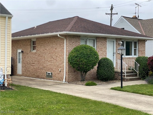 6234 W 54th St, Parma, OH 44129 - view of front of house with brick siding and a shingled roof