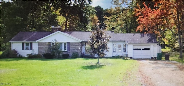 262 W Beech St, Jefferson, OH 44047 - ranch-style house featuring driveway, a garage, a chimney, and a front yard