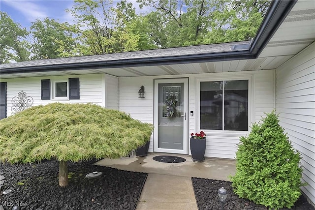 1421 Rolling Meadows Dr, Vermilion, OH 44089 - doorway to property with roof with shingles